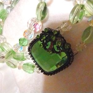 Set of 3 handmade green glass beads and Swarovski crystal accents.